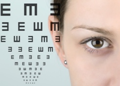 Woman in Front of Eyechart